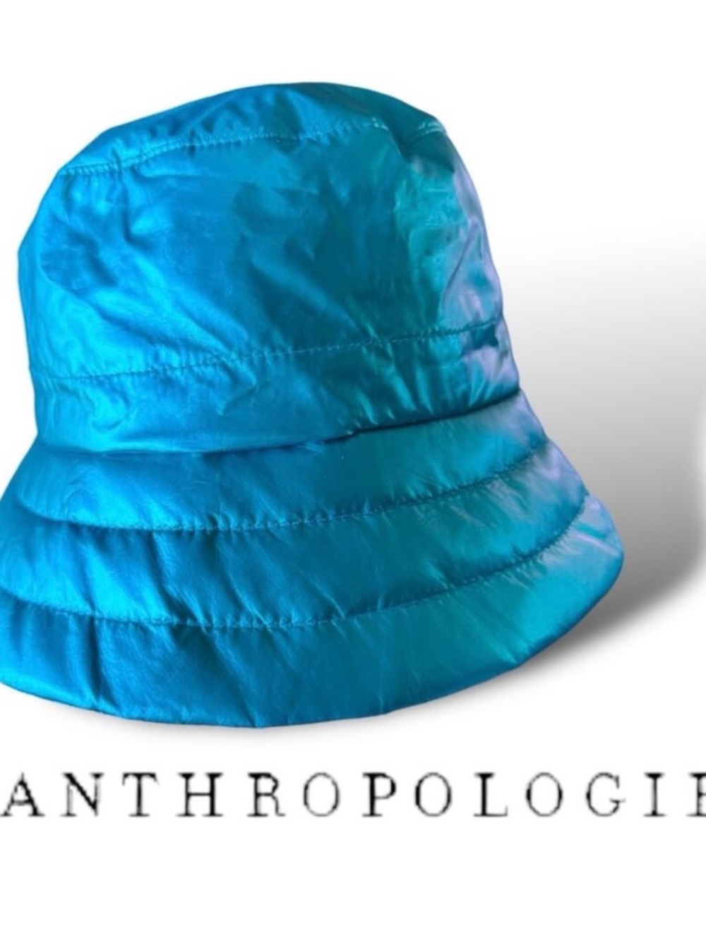 Anthropologie Quilted Puffer Bucket Hat in a metallic teal colorway